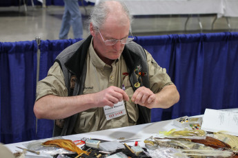 Andrew Marshall demonstrating tying in hand.